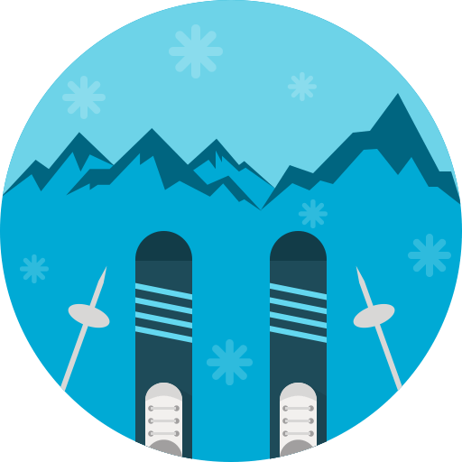 Skis and poles on a snowy mountain slope with snowflakes falling.