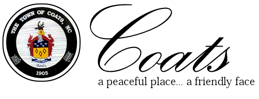 Logo for the town of Coats, North Carolina, containing a coat of arms and text saying Coats, a peaceful place, a friendly face