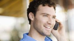 Man calling a landscaping contractor in Canberra