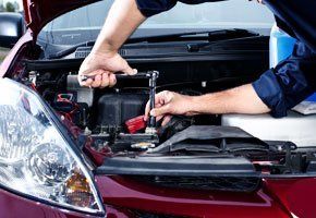Mechanic repairing the car