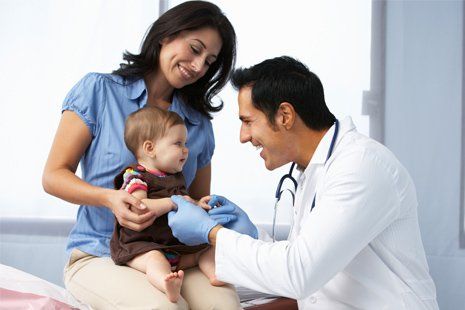 Pediatrician — Pediatrician Checking Child Heartbeat in Panama City, FL Pediatrician — Pediatrician Checking Child Heartbeat in Panama City, FL