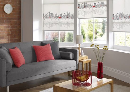 a beautiful living room with decorative blinds