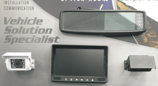 Four vehicle communication displays and modules on a Vehicle Solution Specialist background