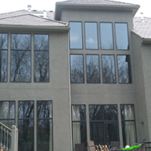 modern house with tinted windows protected from the solar heat near colorado springs 