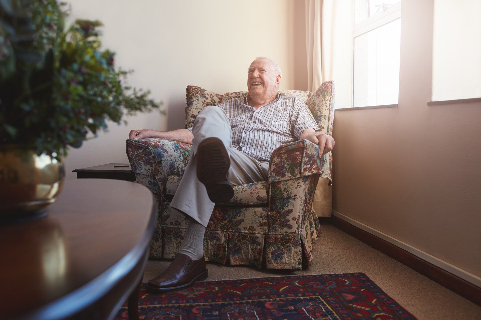 Senior man in chair