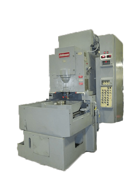 Gray industrial vertical machining center with control panel.