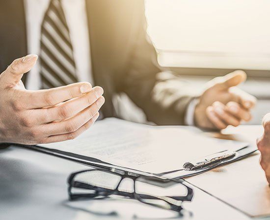Lawyer Talking To Client — Palm Bay, FL — Spira, Beadle & McGarrell Lawyer Talking To Client — Palm Bay, FL — Spira, Beadle & McGarrell