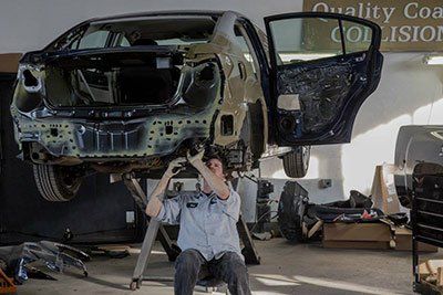 Autobody Shop — Staff Performing Quality Repair in Birmingham, MI