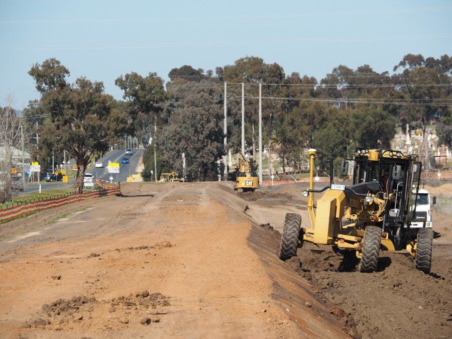 Grader, excavator, earthworks