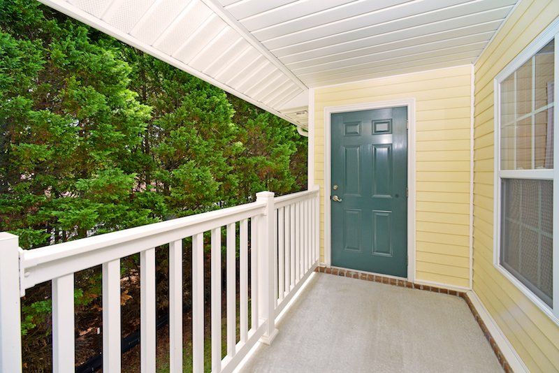 bacon outdoor patio view with storage closet- upstairs patio
