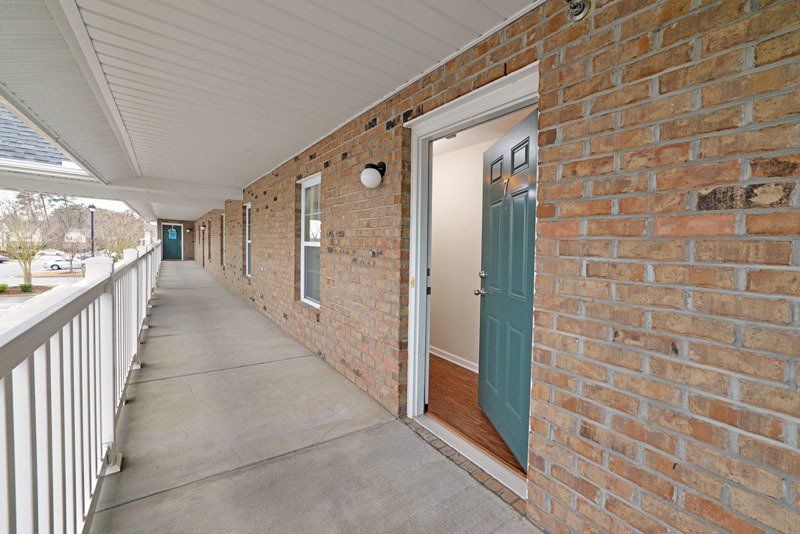 beacon apartment view of front door upstairs along the walkway