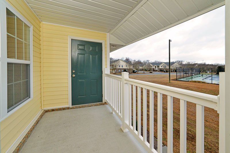 Beacon outdoor balcony photo with storage room door as view