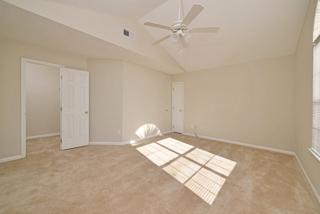 Summit Master bedroom from farthest corner looking toward the entrance and small closet 