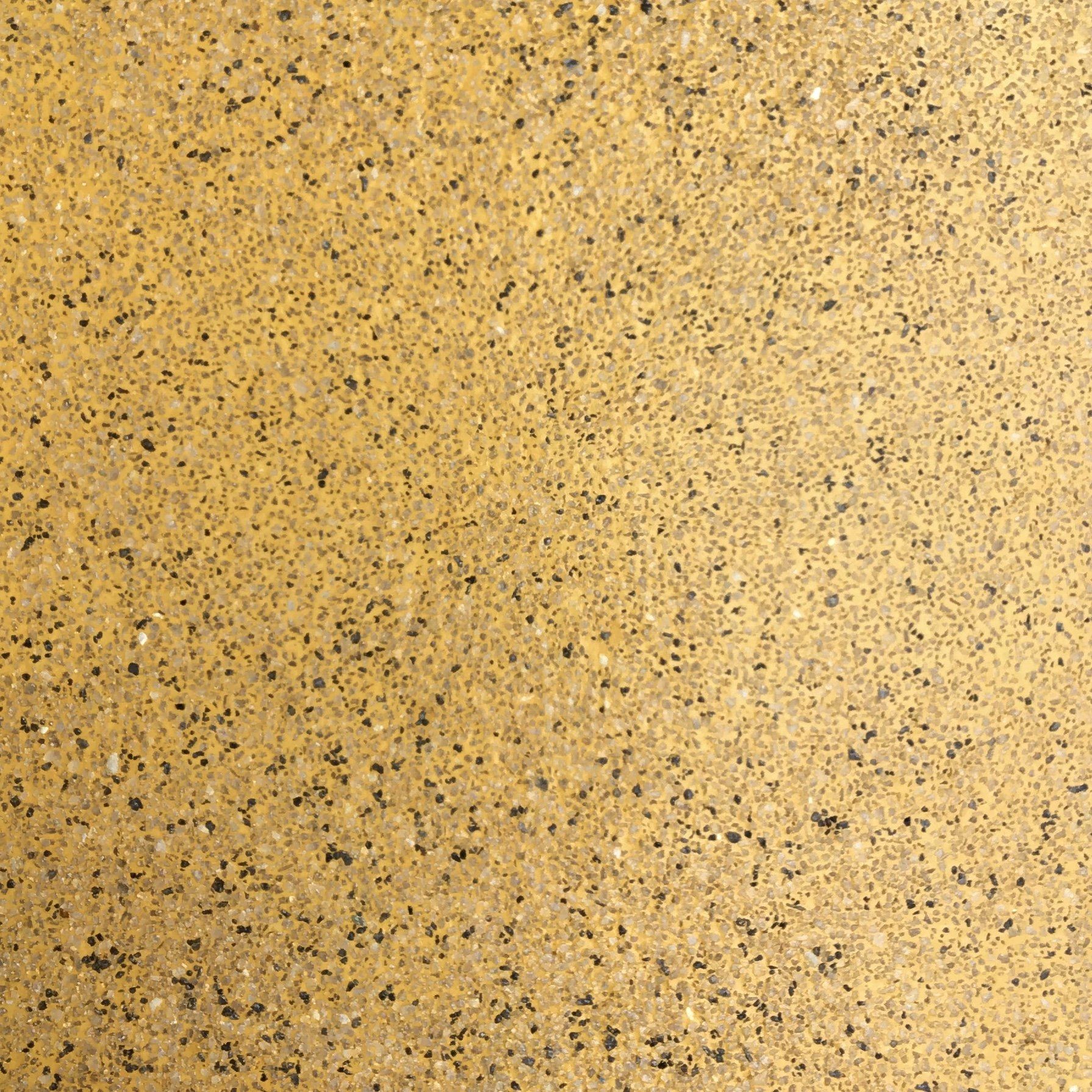 Yellow and black speckled textured surface.