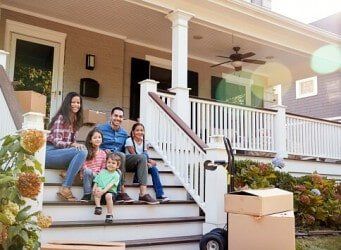 Small Business Attorney — Family In Front of Their House in Highland, IN