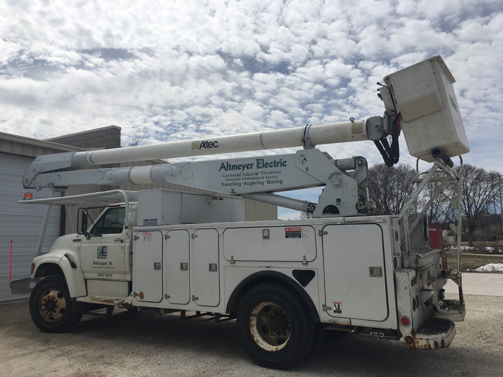 Electricians — White Bucket Truck in Sheboygan, WI Electricians — White Bucket Truck in Sheboygan, WI