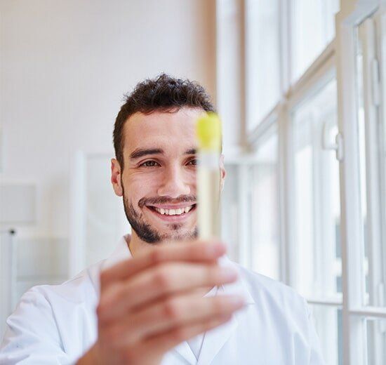 Medical Staff Holding Testing Tubes — Drug Testing And Training Solutions in Rockhampton, QLD