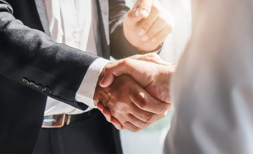 Shaking Hands With The Client — Austin, TX — The Novy Company Shaking Hands With The Client — Austin, TX — The Brian Novy Co.