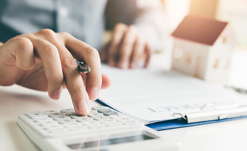 Seller Using Calculator — Austin, TX — The Novy Company Seller Using Calculator — Austin, TX — The Brian Novy Co.