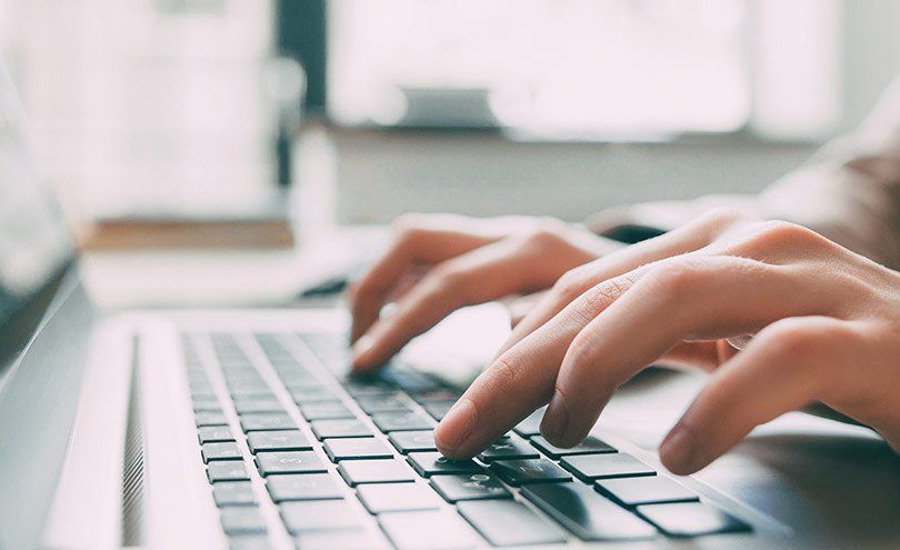 Typing On A Laptop — Austin, TX — The Novy Company Typing On A Laptop — Austin, TX — The Brian Novy Co.