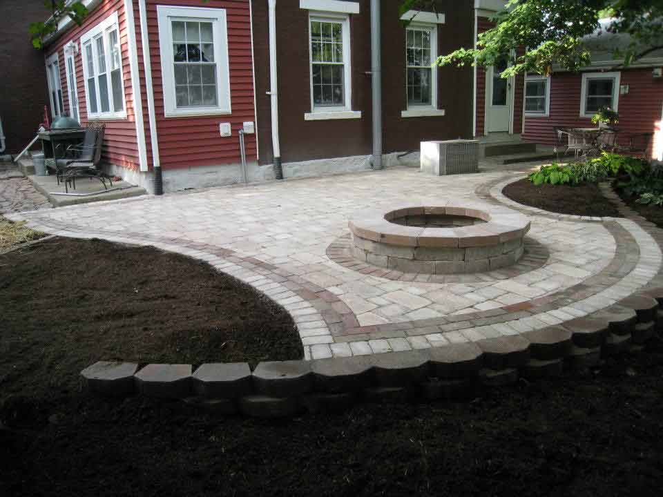 Nice landscape bricking patio with firepit installed in Mapleton, IL - Beal Landscaping