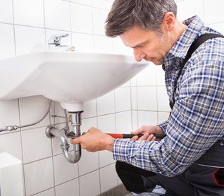 Plumber Fitting Sink Pipe — Aiken, SC — McNeill Plumbing Plumber Fitting Sink Pipe — Aiken, SC — McNeill Plumbing