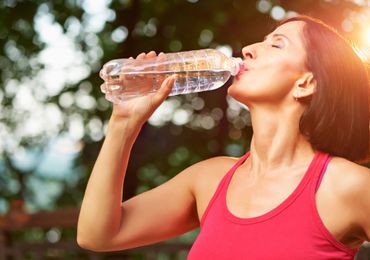 Reverse Osmosis — Athletic Woman Drinks Water in Arroyo Grande, CA Reverse Osmosis — Athletic Woman Drinks Water in Arroyo Grande, CA