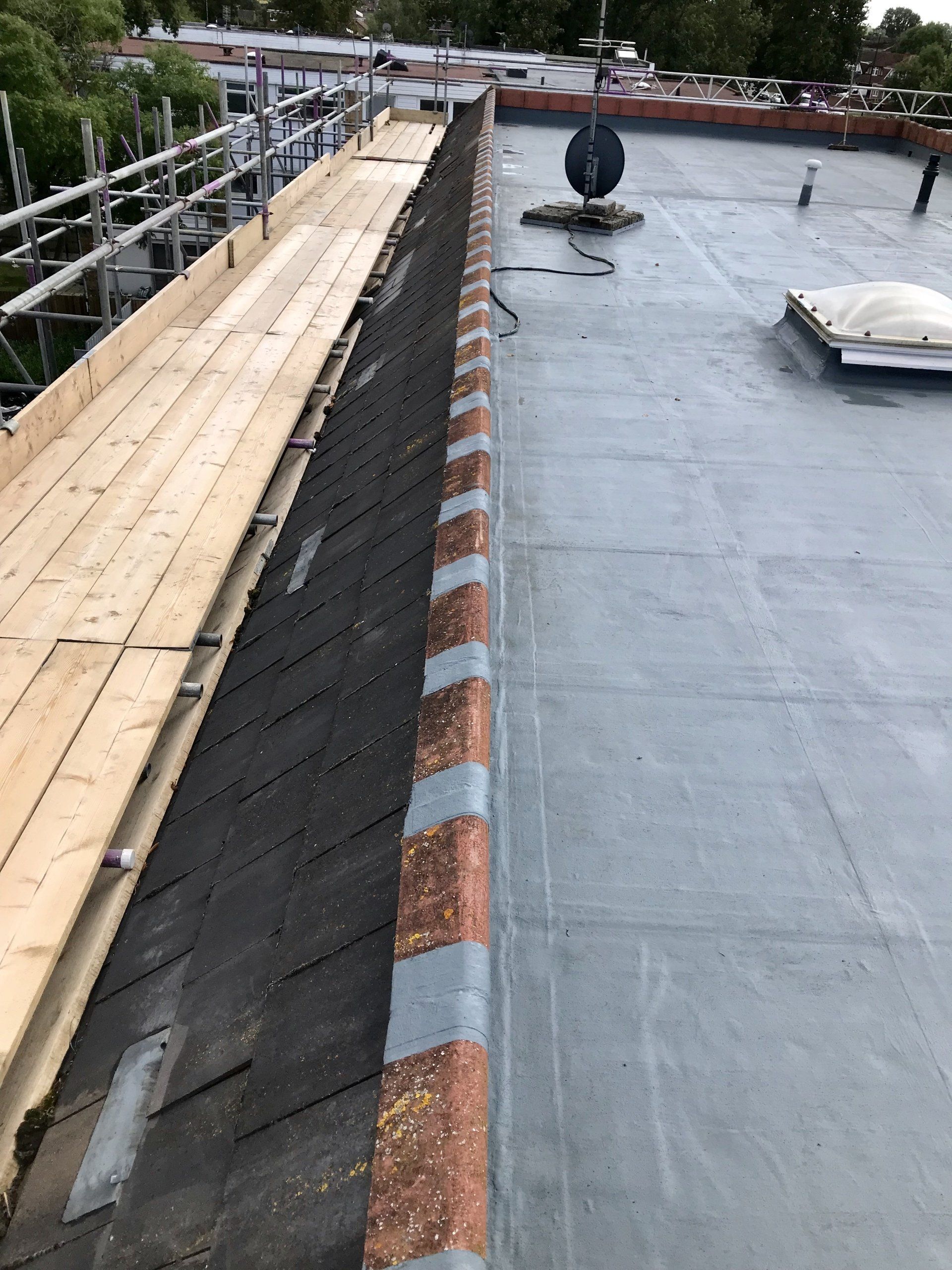 A roof with a wooden scaffolding on top of it