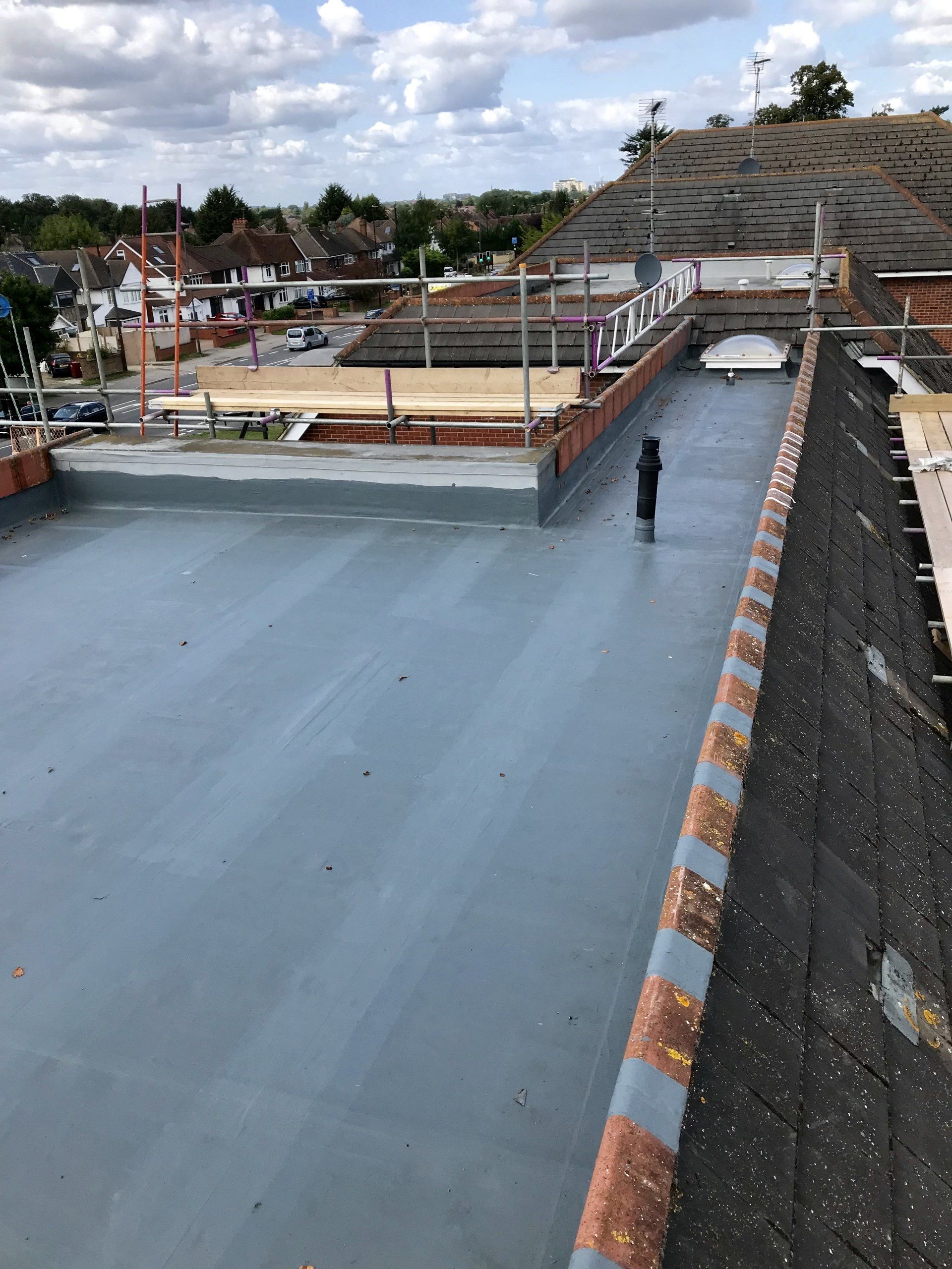 A roof with a scaffolding on it is being built.