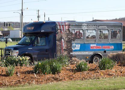 bus wrap graphics for national guard