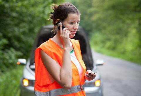 woman calling for roadside assistance in Columbia, MD