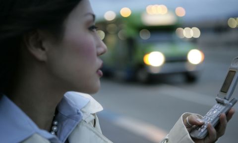 Woman calling for vehicle towing in Columbia, MD