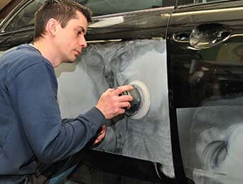 Mechanic Polishing Auto Body — Collision Repair in Portland, OR Mechanic Polishing Auto Body — Collision Repair in Portland, OR