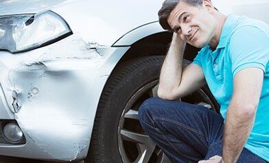 Inspecting Damage after Car Accident — Collision Repair in Portland, OR Inspecting Damage after Car Accident — Collision Repair in Portland, OR