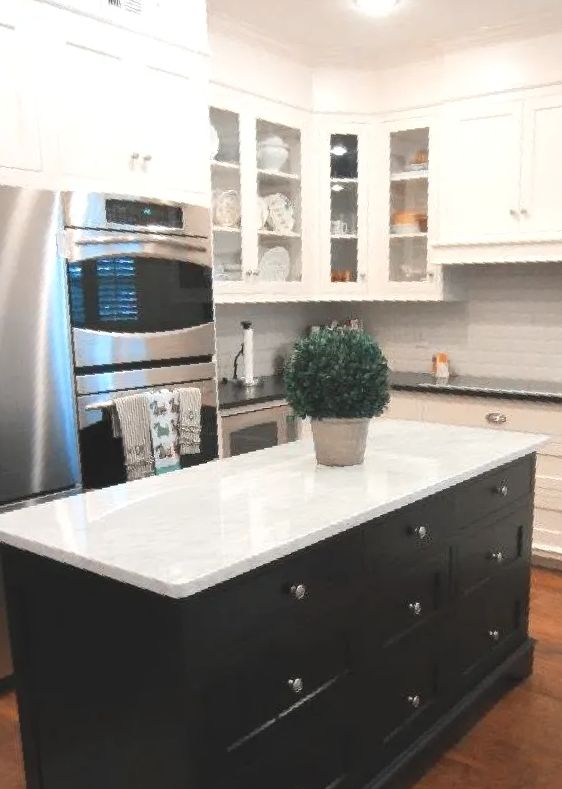 Modern kitchen remodel with white cabinets and granite countertops