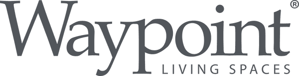 Waypoint Living Spaces logo with gray text and a small blue accent above the “i”