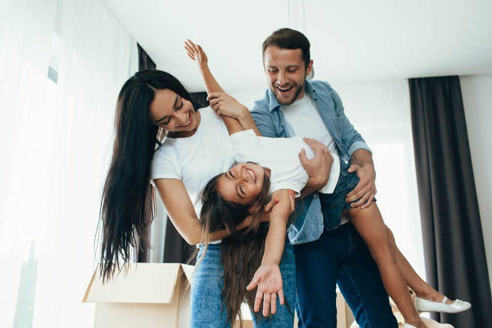 Family Playing — Woodsfield, OH — Francis J Paulus Insurance Agency