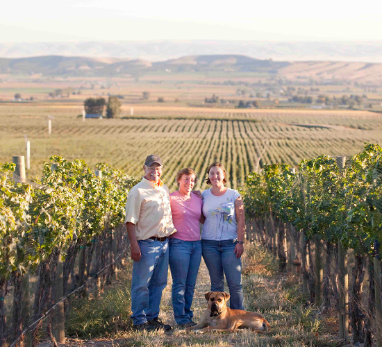Hugh, Kathy, Kerry, and vineyard dog Max in DuBrul Vineyard