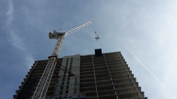 Crane lifting Zarafa BMU components on to Media City