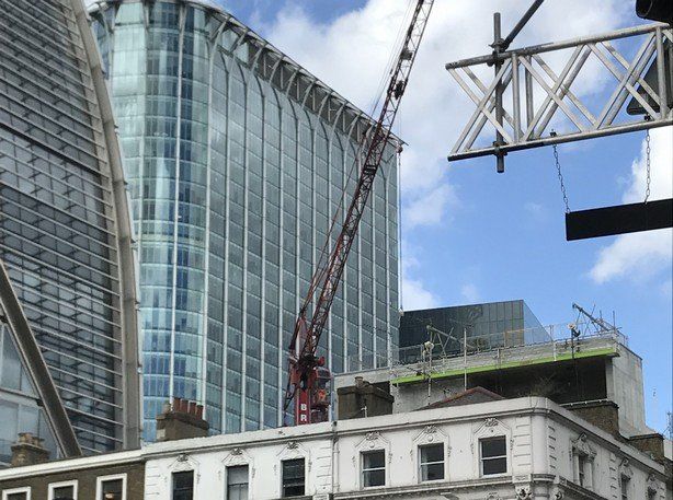 Temporary cradle system to provide access to Crossrail