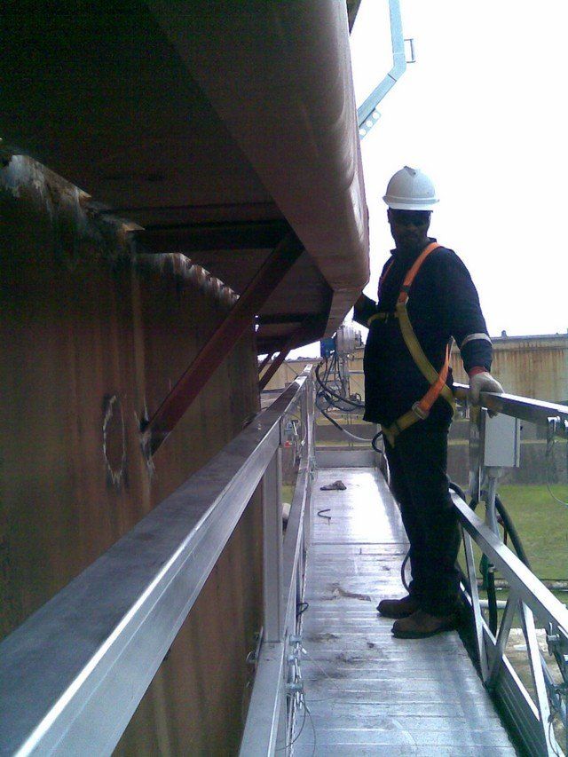 Suspended access systems for tanks