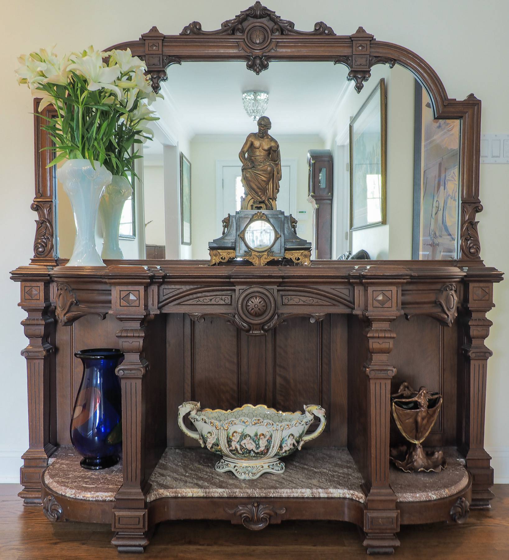 decorative mirror with shelves underneath