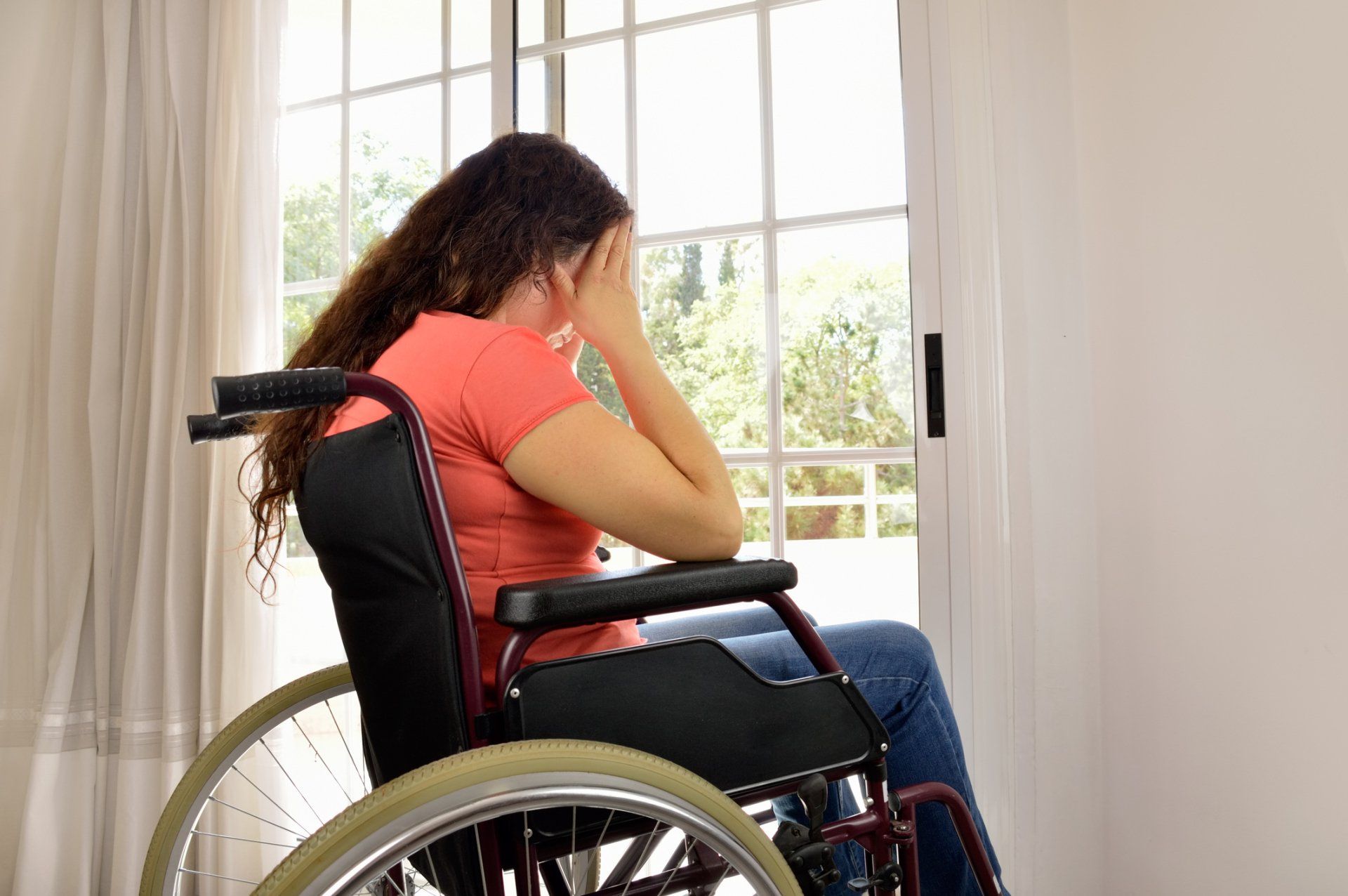 Woman in Wheelchair — Ames, IA — Thornton & Coy, PLLC Woman in Wheelchair — Ames, IA — Thornton & Coy, PLLC