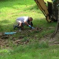 Men Inspecting Site — Septic Tank Contractor in Wythe County, VA