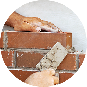 Masonry Fixing — Man Laying Bricks on A New House in Albany, CA Masonry Fixing — Man Laying Bricks on A New House in Albany, CA