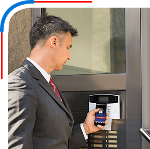 Residential Locksmith Services | A man unlocking a door with an app