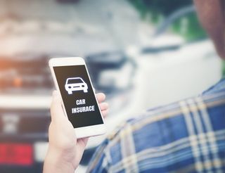Auto Insurance — Man Holding a Mobile Phone with Car Insurance App In Mcalester, OK Auto Insurance — Man Holding a Mobile Phone with Car Insurance App In Mcalester, OK