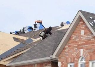 Roof with a Chimney — J & J Home Improvements in York, PA Roof with a Chimney — J & J Home Improvements in York, PA