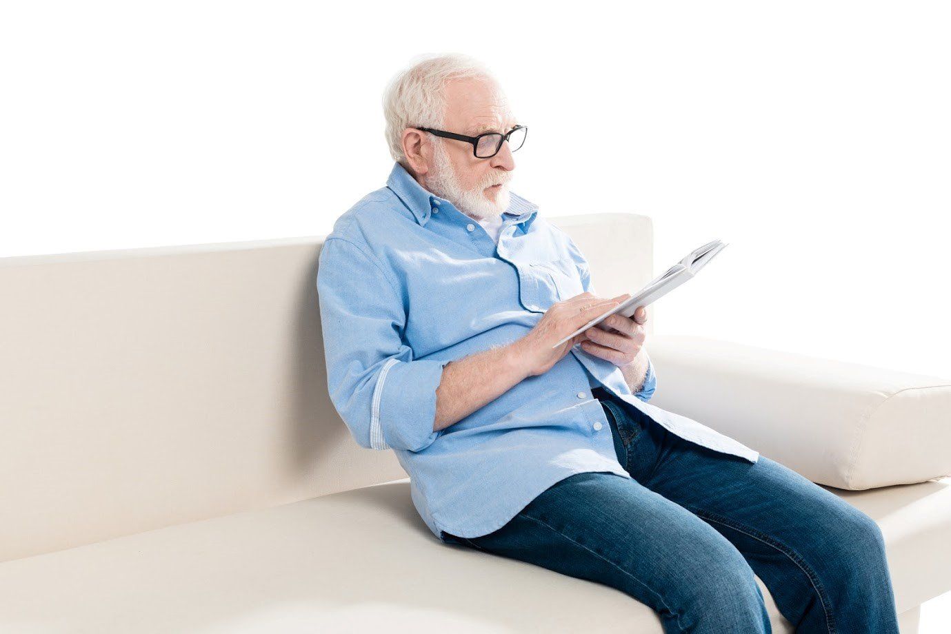 Old Man Reading A Book — Goodrich, MI — Davison Chiropractic