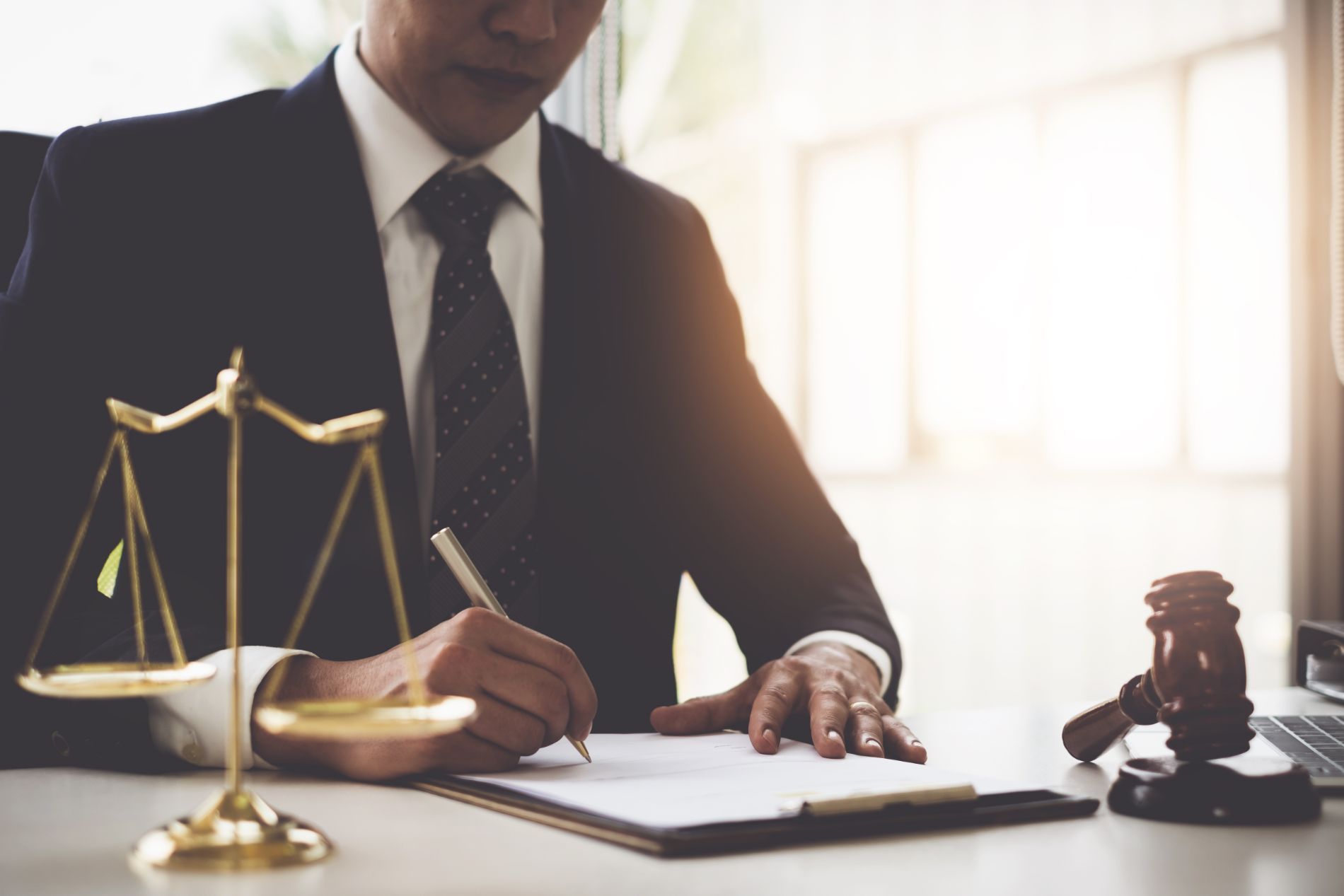 Man signing legal papers